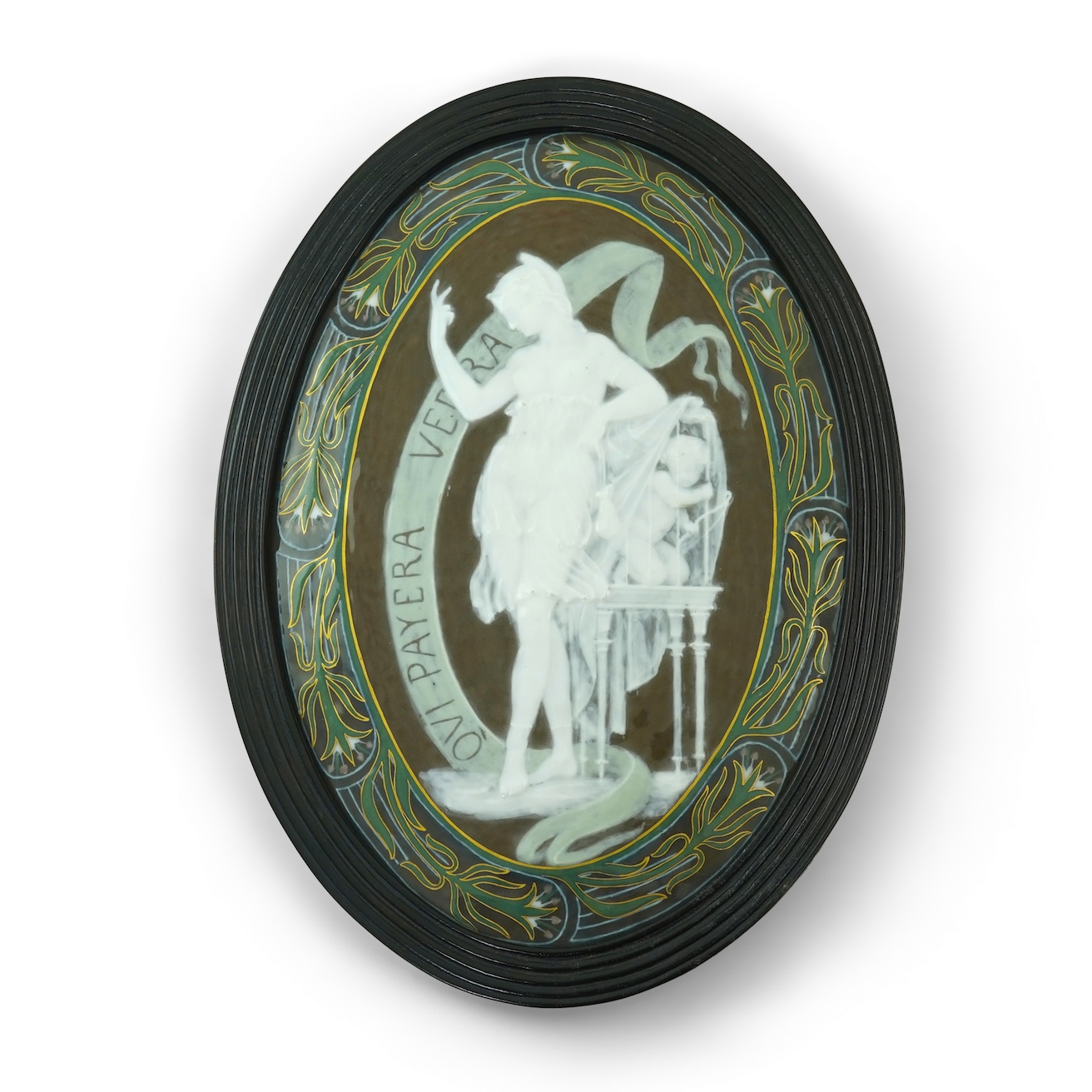 A late 19th century English pate sur pate oval porcelain plaque in the style of Louis Solon